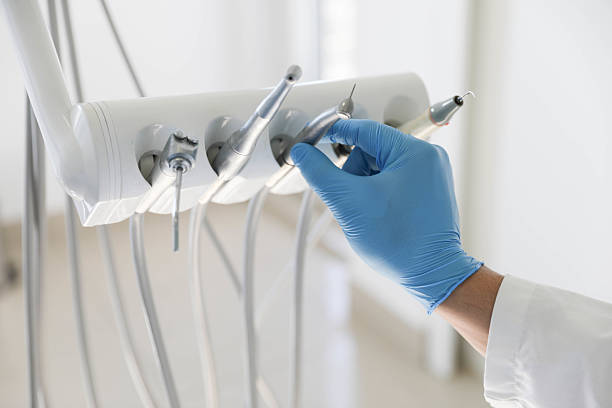 Professional Tooth Extraction technician working in Fulshear, TX